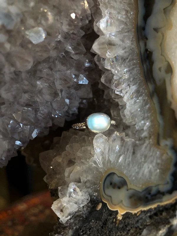 Blue Topaz over Mother of Pearl Ring